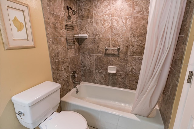 bathroom featuring shower / bath combination with curtain and toilet