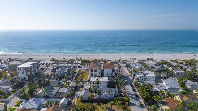 aerial view featuring a water view and a beach view