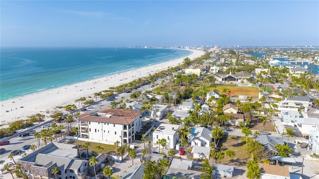 bird's eye view with a beach view and a water view