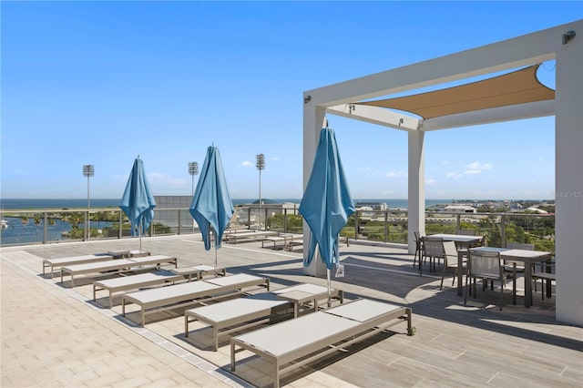 view of patio / terrace with a water view