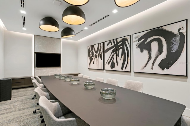 dining area with light hardwood / wood-style flooring