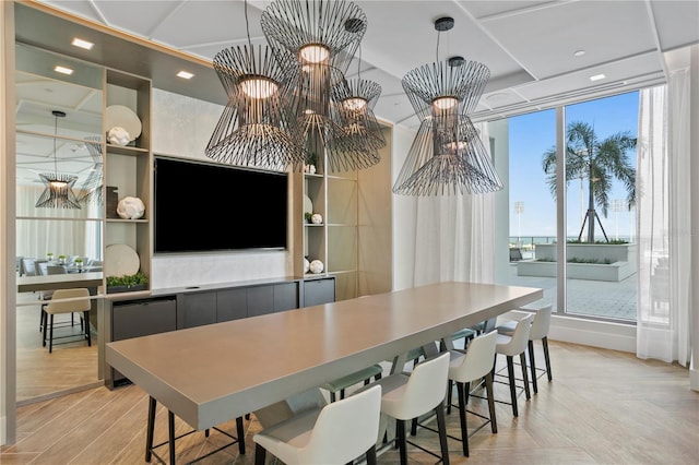 dining area with light hardwood / wood-style floors