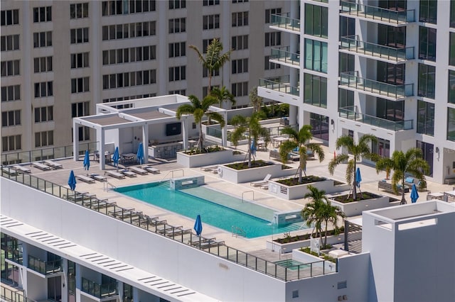 view of pool featuring a patio area