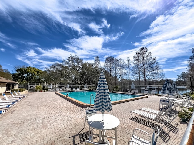 view of pool with a patio area