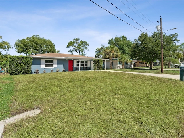 single story home with a front yard