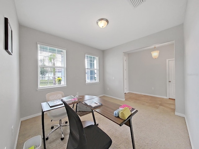 office featuring visible vents and baseboards