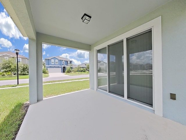 view of patio / terrace with a residential view