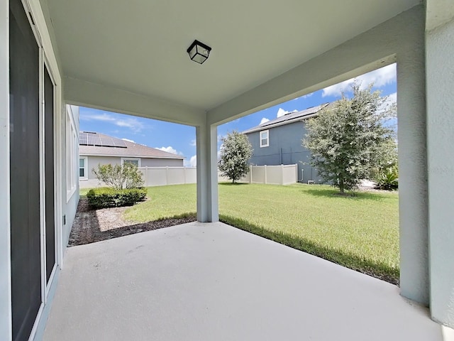 view of patio featuring fence