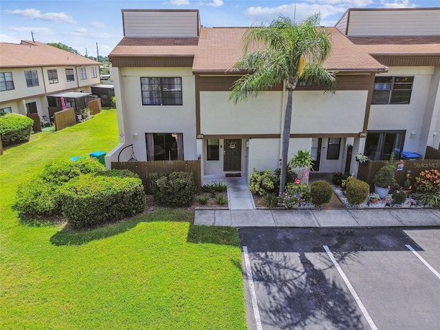 view of front of property with a front lawn