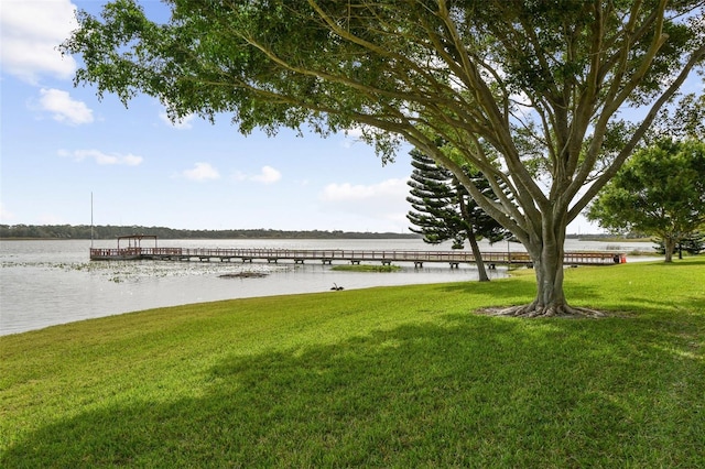 water view featuring a dock