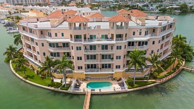 birds eye view of property featuring a water view