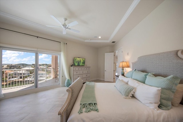 bedroom with ceiling fan, ornamental molding, a tray ceiling, and access to exterior