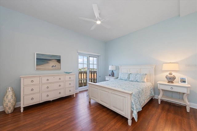 bedroom featuring dark wood-type flooring, access to outside, and ceiling fan