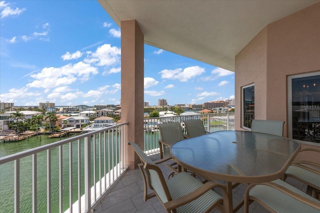 balcony featuring a water view