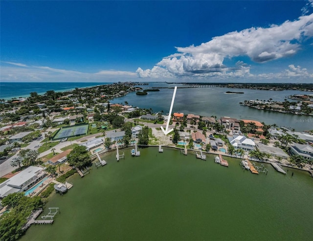 bird's eye view with a water view