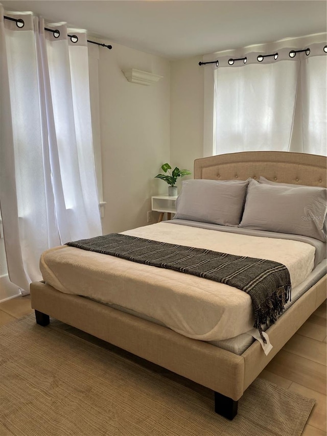 bedroom featuring light hardwood / wood-style floors