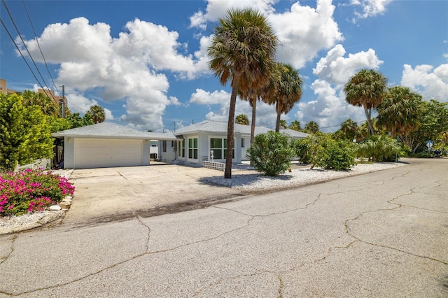 single story home with a garage