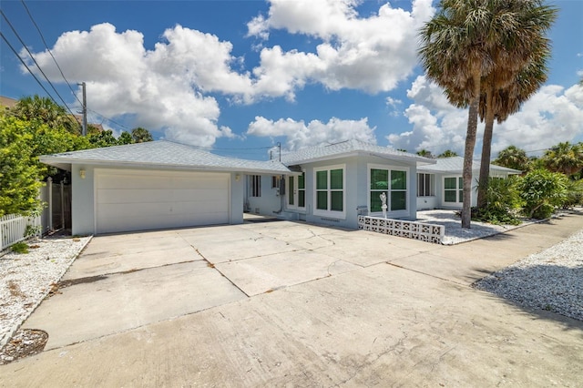 back of property with a garage