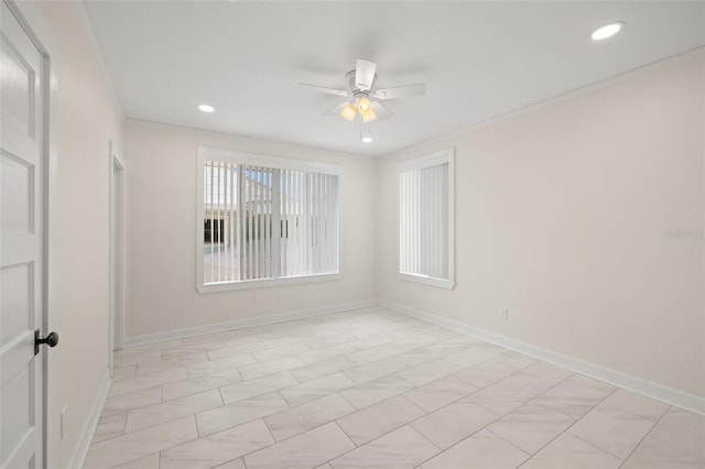 spare room featuring ceiling fan and light tile patterned floors