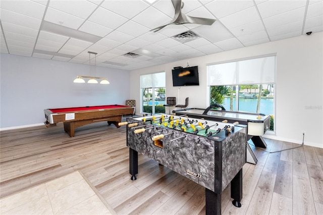 game room featuring visible vents, a drop ceiling, and wood finished floors