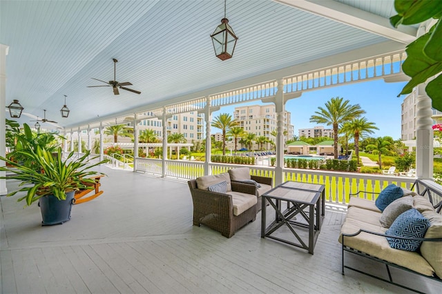 view of patio with an outdoor hangout area, a deck, and ceiling fan