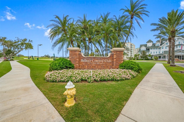 community sign with a lawn