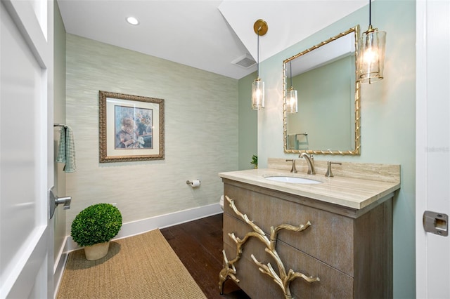 bathroom featuring wood-type flooring and vanity