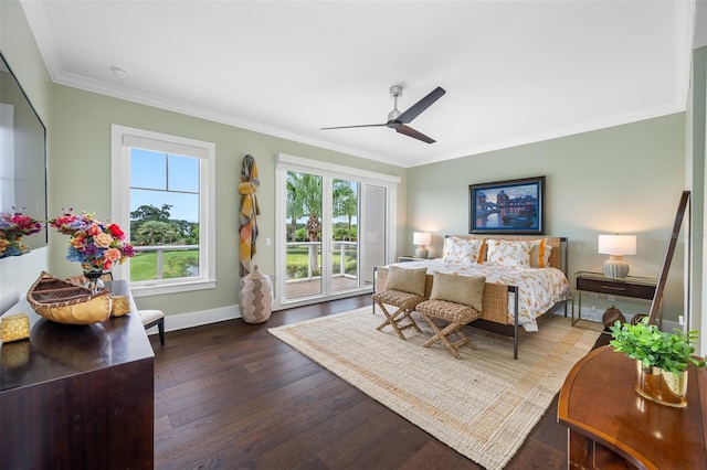 bedroom with ceiling fan, ornamental molding, and dark hardwood / wood-style flooring