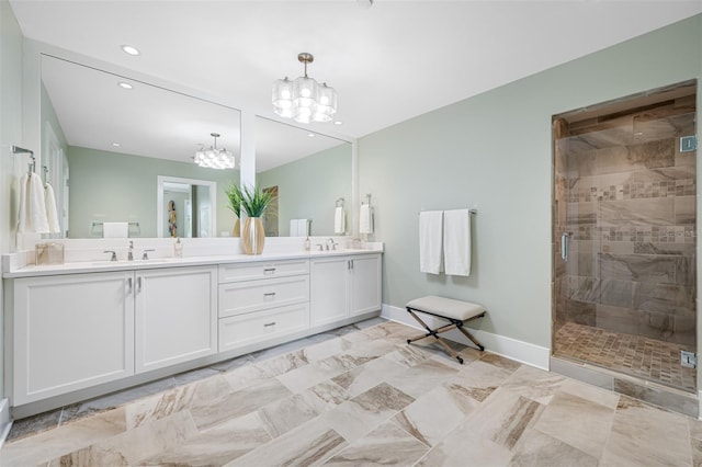 6 Hibiscus Ln, Belleair, FL 33756 - full bath featuring a chandelier, double vanity, a stall shower, baseboards, and recessed lighting