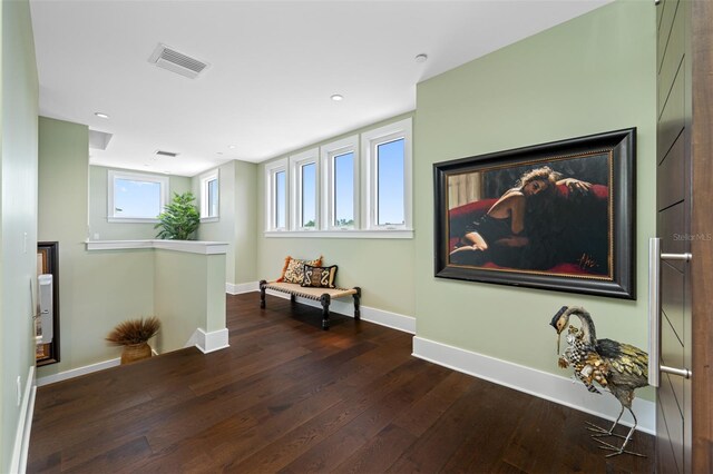 6 Hibiscus Ln, Belleair, FL 33756 - living area featuring hardwood / wood-style flooring, baseboards, and recessed lighting