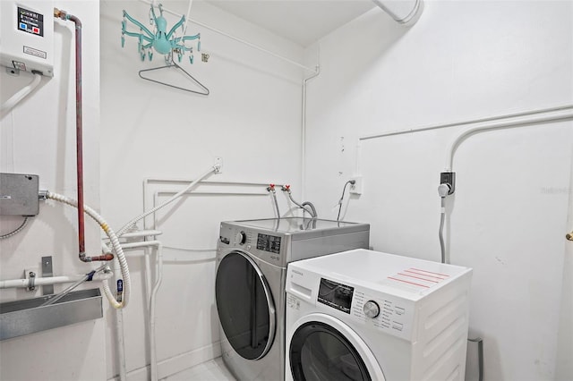 laundry area featuring washing machine and dryer