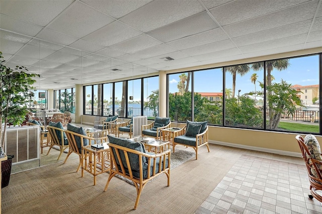 sunroom with a drop ceiling