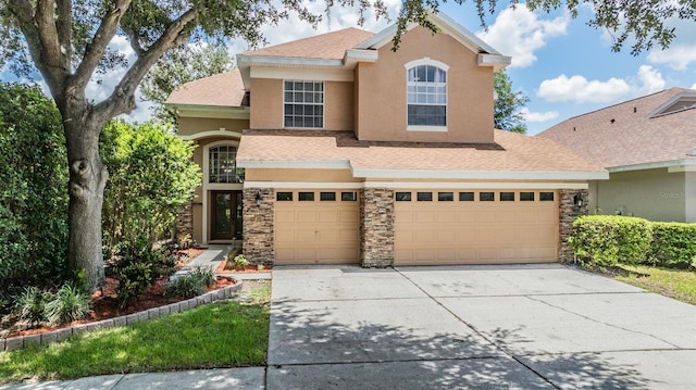 front of property featuring a garage