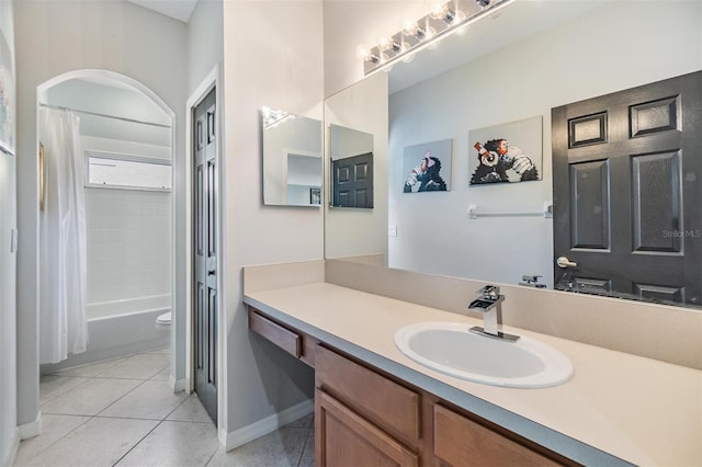 full bathroom featuring tile patterned flooring, vanity, shower / bathtub combination with curtain, and toilet