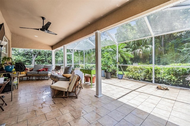 sunroom / solarium with vaulted ceiling and ceiling fan