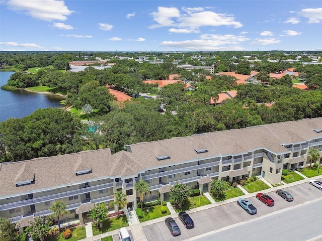 drone / aerial view with a water view