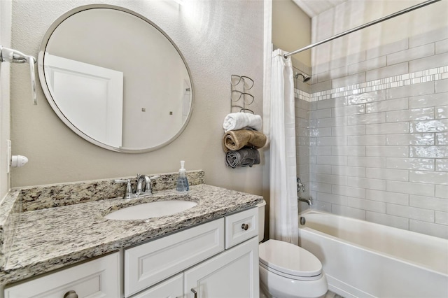 full bathroom with vanity, shower / bathtub combination with curtain, and toilet