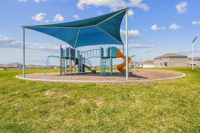 view of jungle gym with a lawn