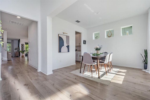 dining area featuring light hardwood / wood-style flooring