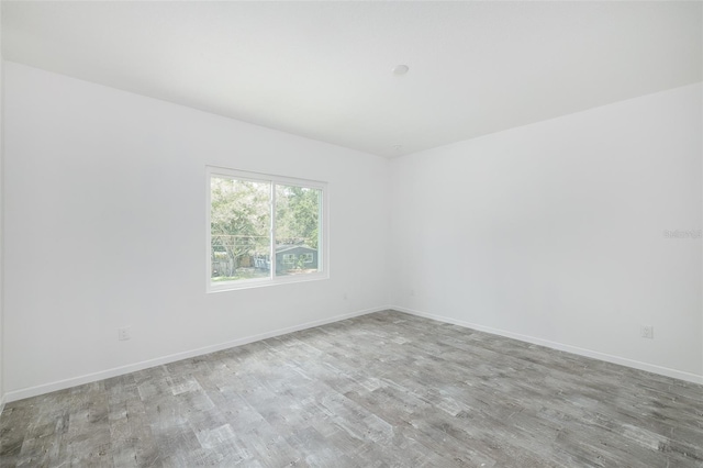 empty room with light wood-type flooring