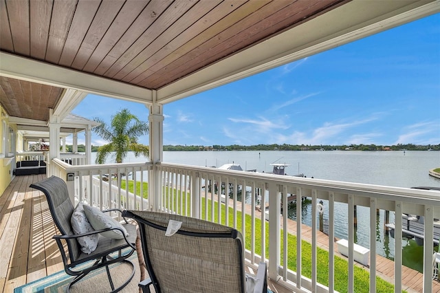 balcony featuring a water view