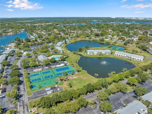 birds eye view of property featuring a water view