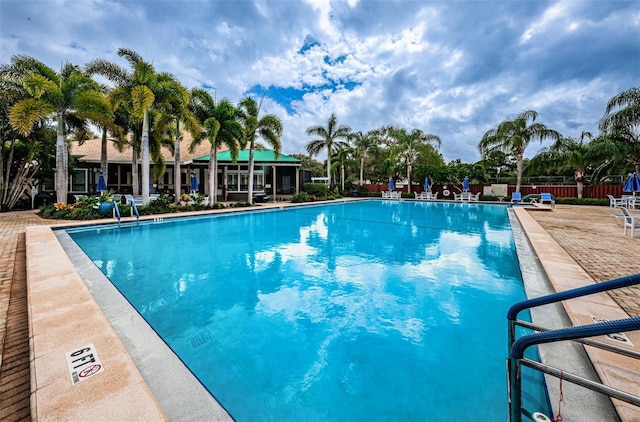 view of swimming pool with a patio area