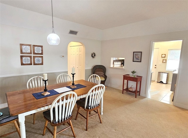 view of carpeted dining room