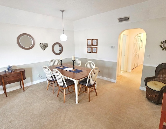 view of carpeted dining space