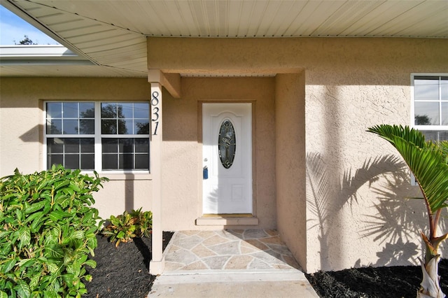 831 Searcy Ave, Sarasota, FL 34237 - property entrance with stucco siding