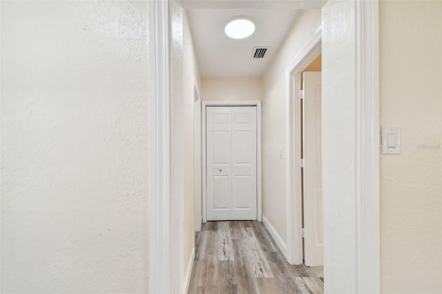 hall featuring light hardwood / wood-style flooring