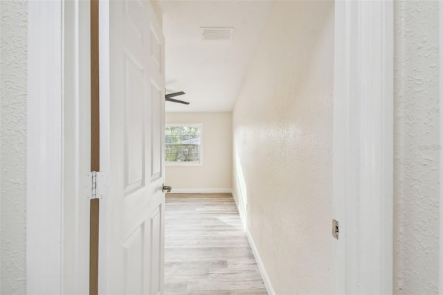 hall featuring light hardwood / wood-style floors