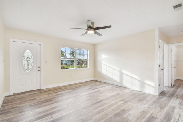 entrance foyer featuring light wood-type flooring and ceiling fan