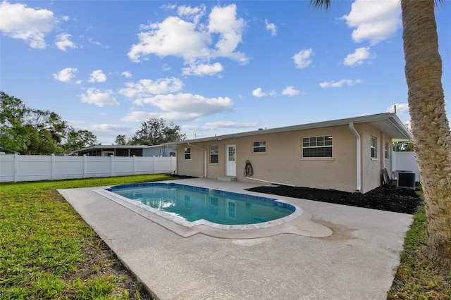 view of pool featuring a patio area and central AC